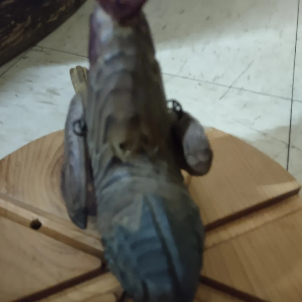 Wooden Bird Figurine with Purple and Brown Accents