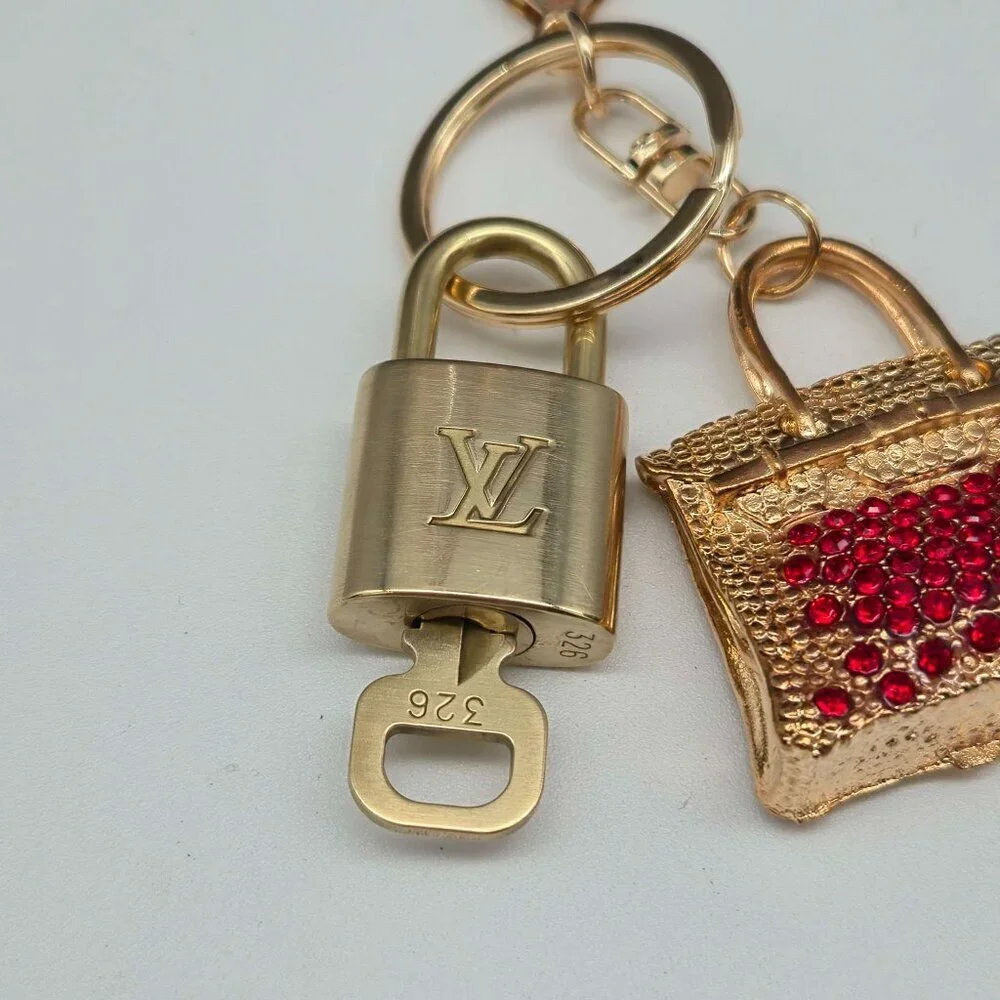 Louis Vuitton keychain shiny