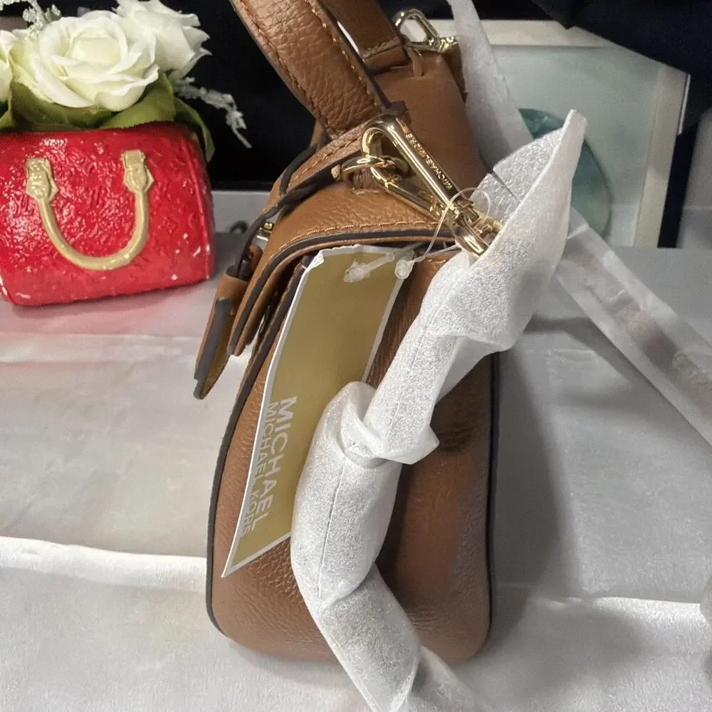 Michael Kors retails $368