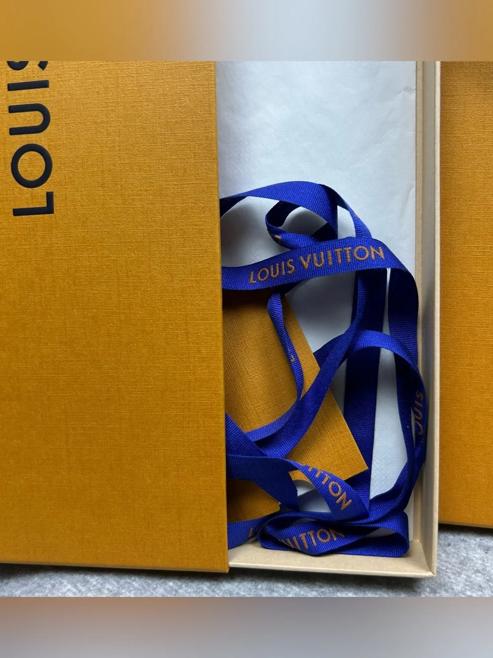 Louis Vuitton included ribbon accessories