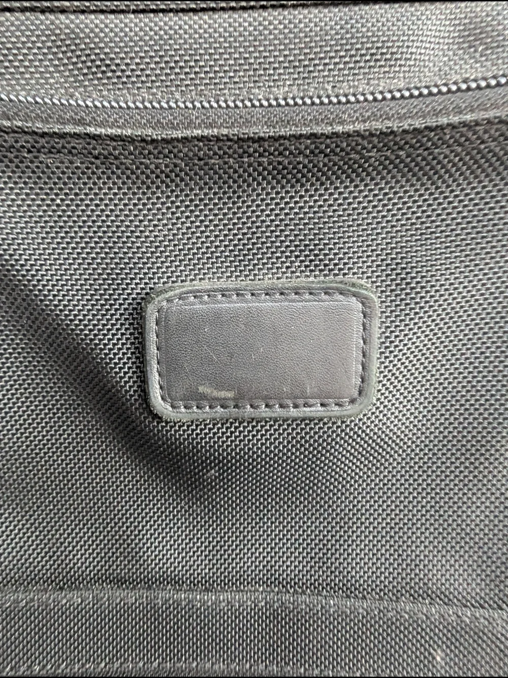 Tumi Black Men’s Carry-On Rolling Travel Bag
