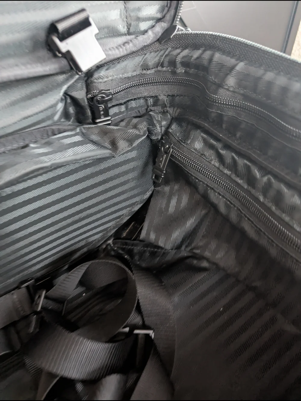 Tumi Black Men’s Carry-On Rolling Travel Bag