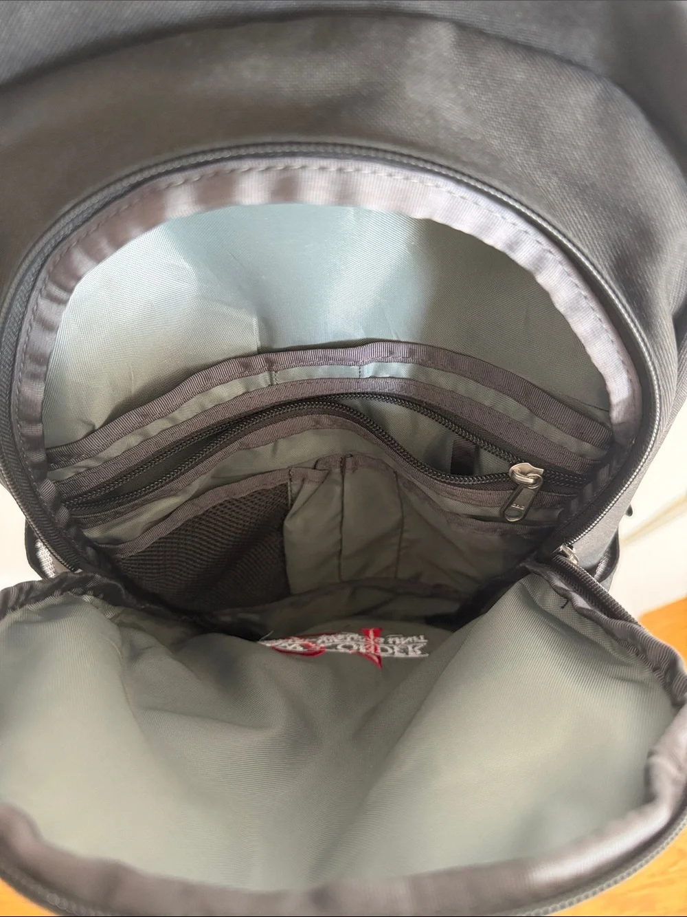 The North Face Black Backpack with Red Law & Order SVU Accent