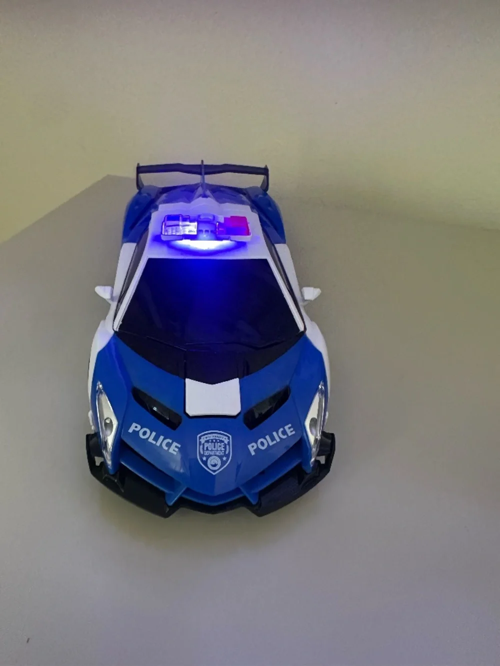 Remote control transforming police car