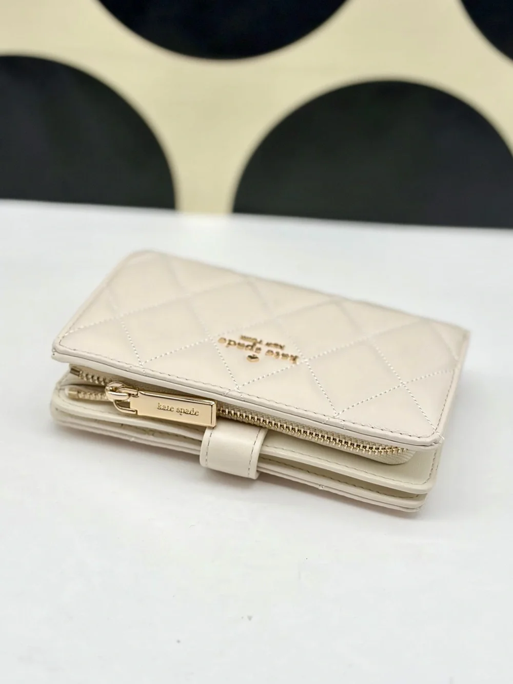 kate spade Cream Quilted Leather Compact Wallet with Gold Logo