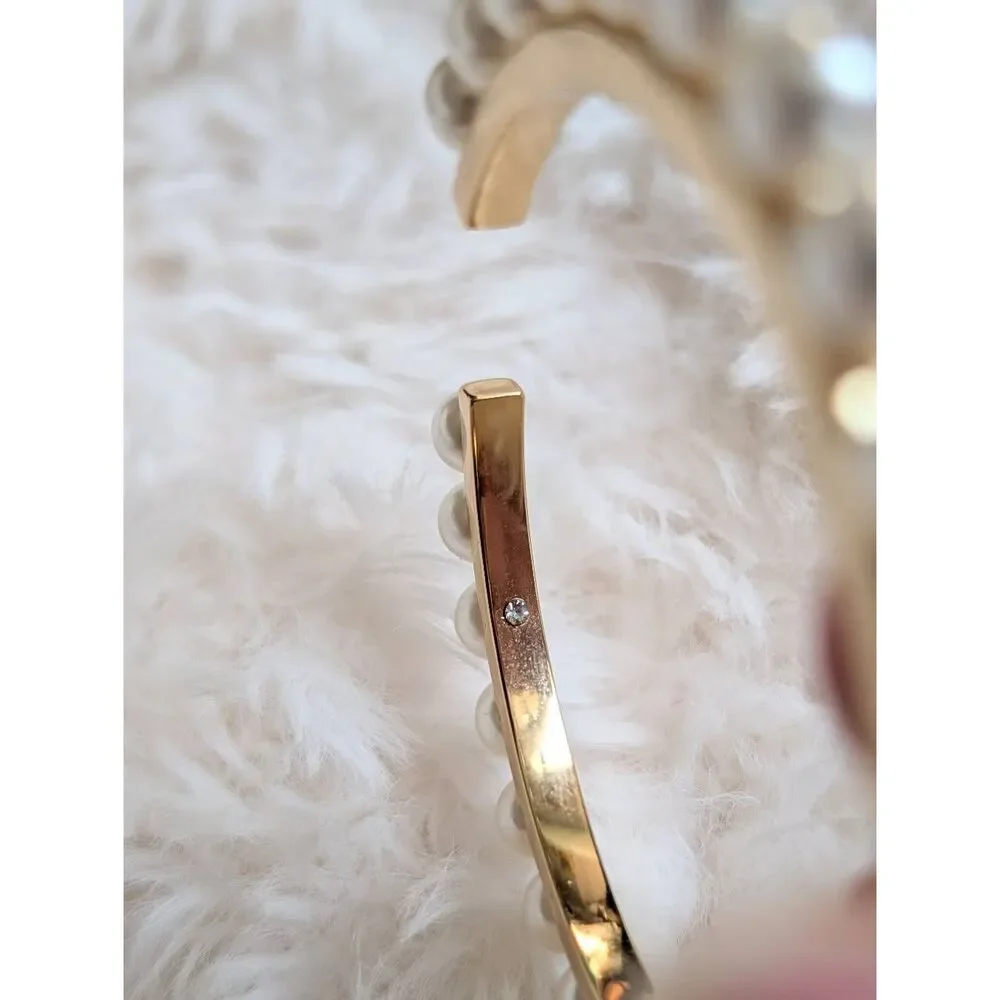 Tory Burch by surrounded