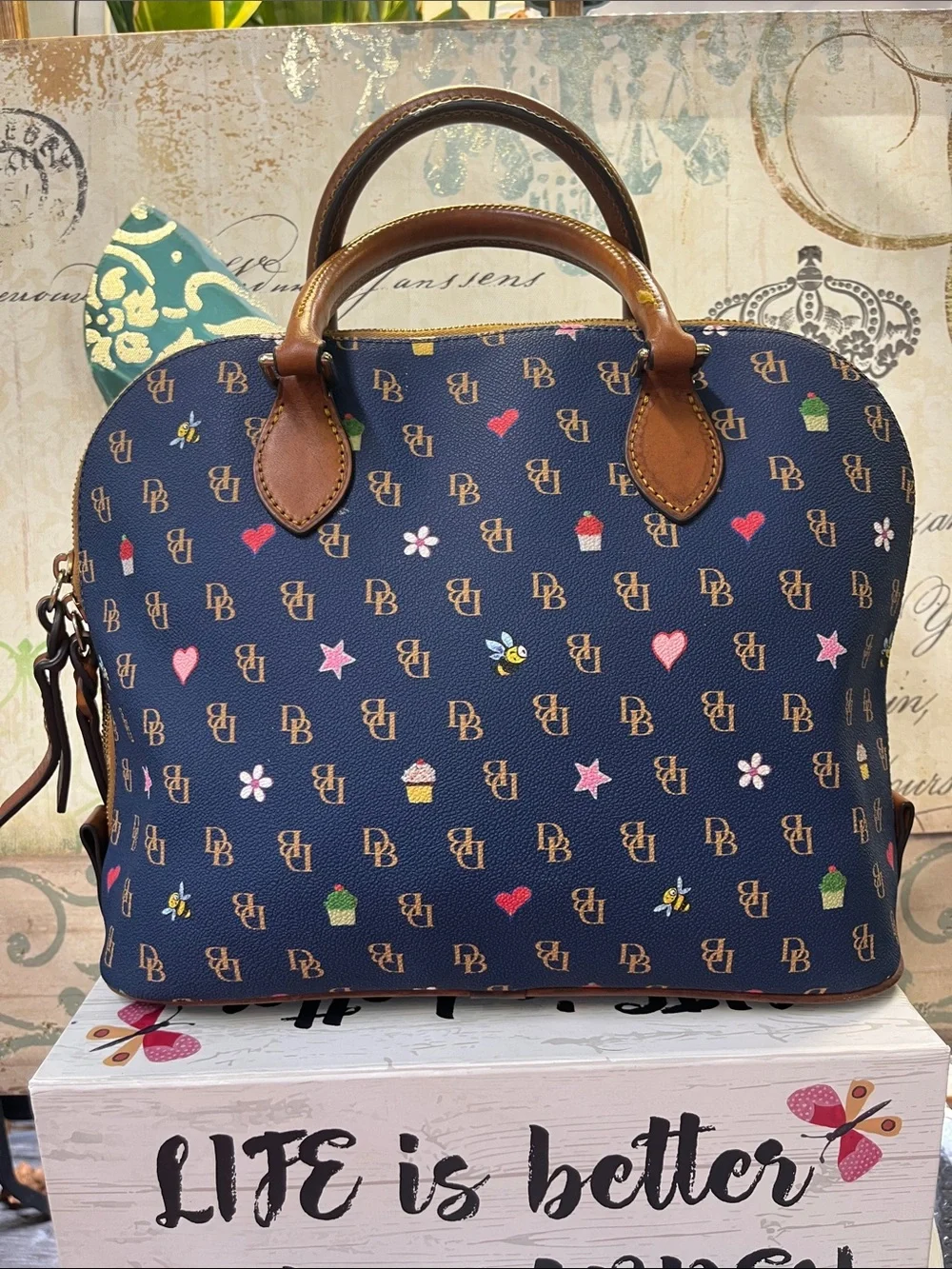 Dooney & Bourke Navy Satchel with Brown Trim and Multicolor Motifs