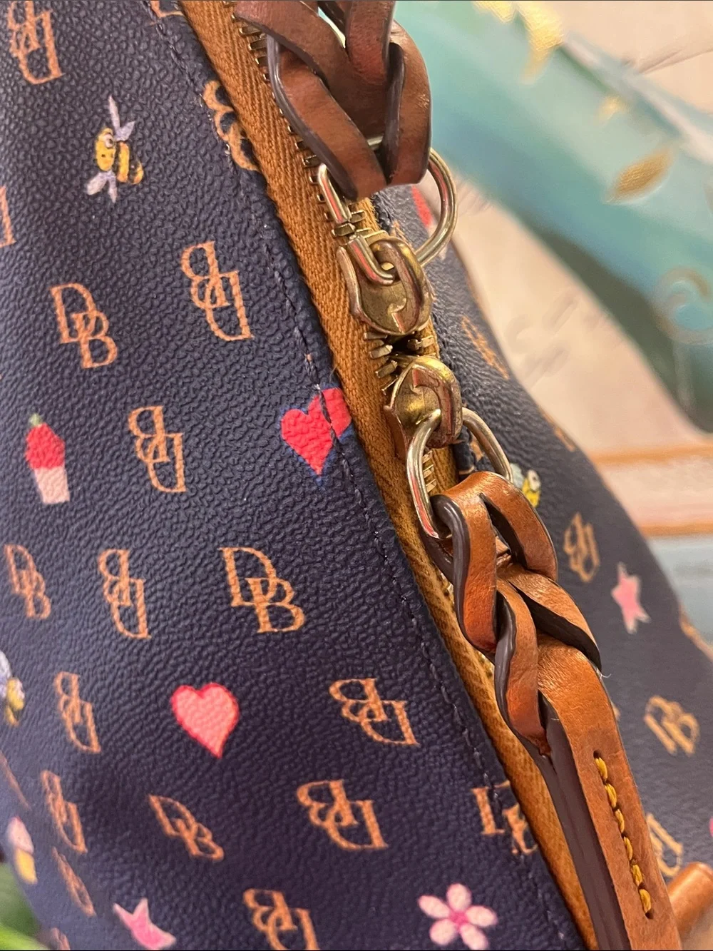 Dooney & Bourke Navy Satchel with Brown Trim and Multicolor Motifs