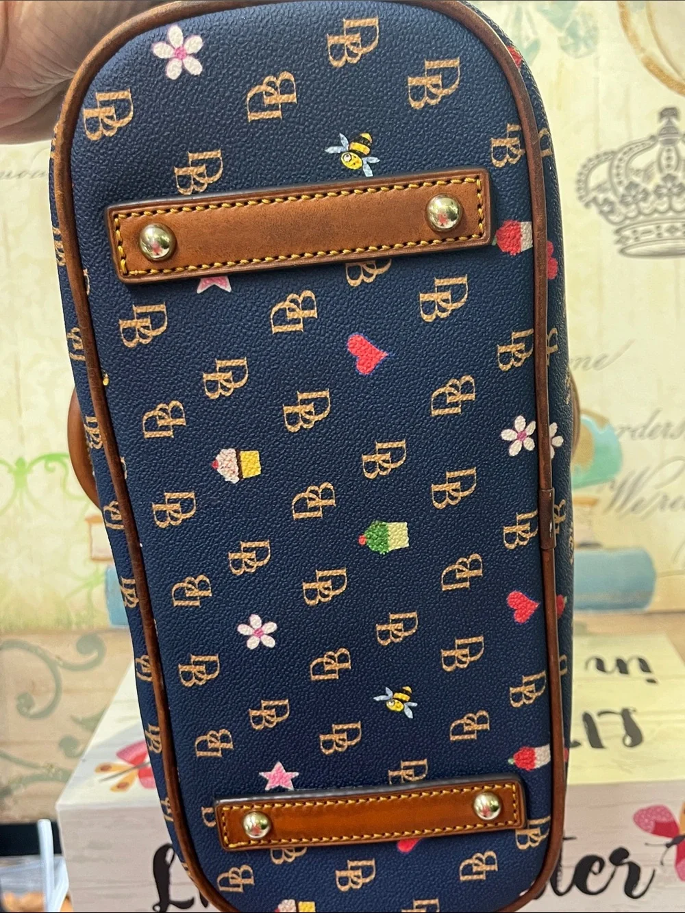 Dooney & Bourke Navy Satchel with Brown Trim and Multicolor Motifs