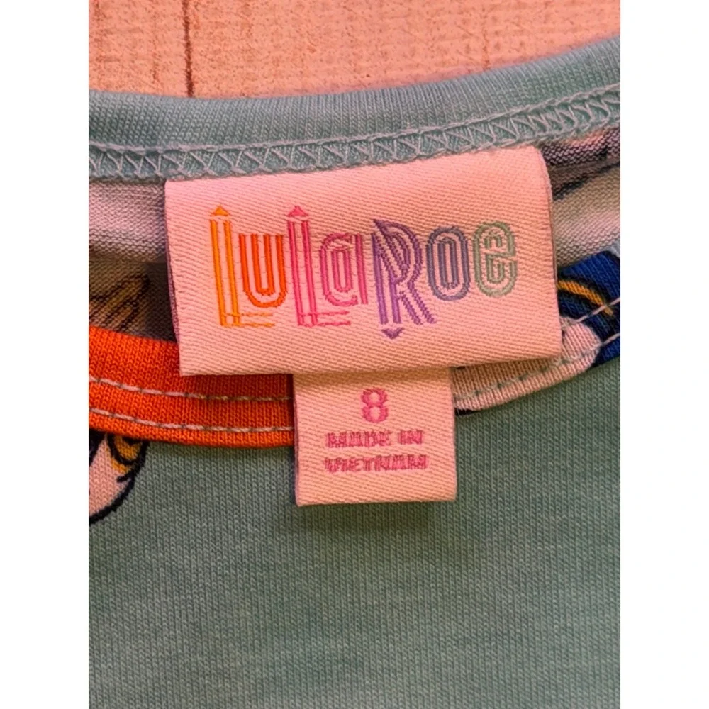 LuLaRoe Disney Donald Duck Gracie Top Kids Size 8 NWT Blue Geometric High Low‎