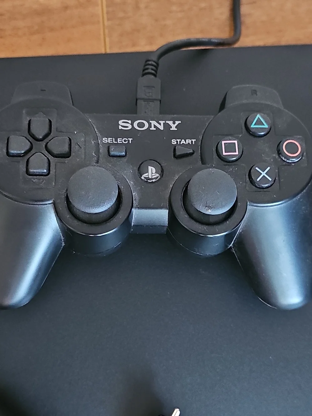 Sony PS3 Slim Console with Black Controller and AV Cables