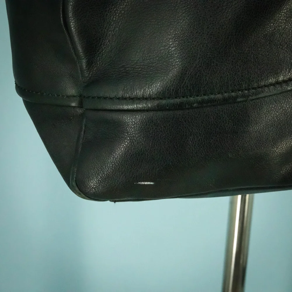 Tumi black leather