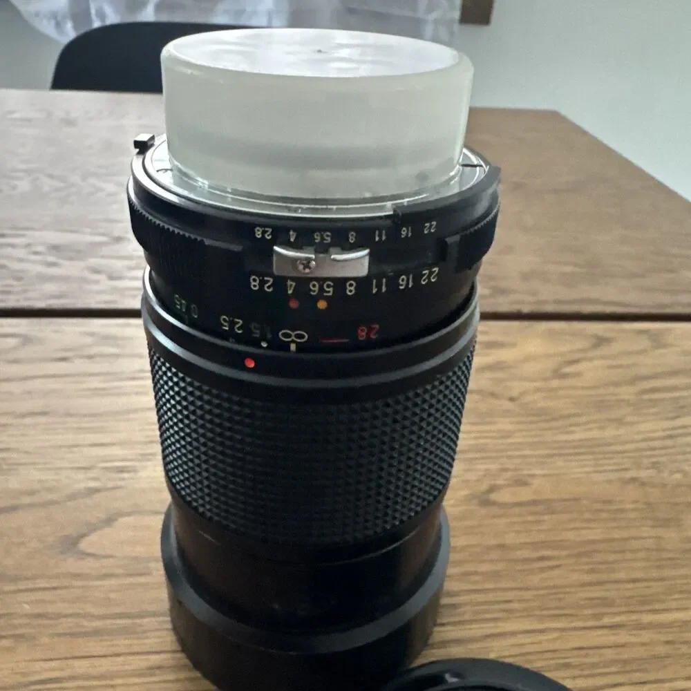 vintage Vivitar 28-85mm f/2.8-3.8 MC macro focusing camera lens.