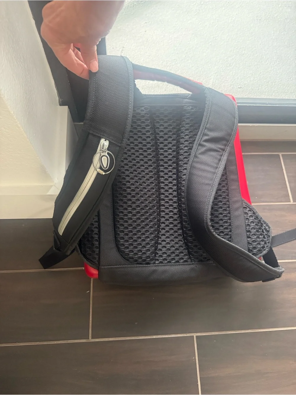 This is a Tumi T3 backpack designed in collaboration with Ducati