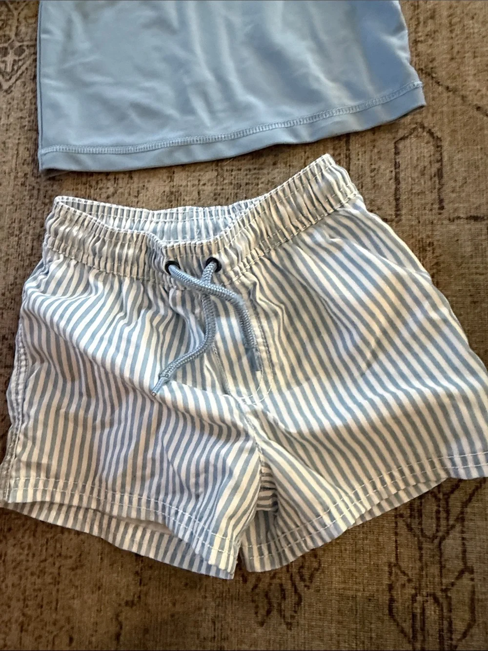 Carters Kids Two-Piece Light Blue Rash Guard and Striped Swim Shorts Set