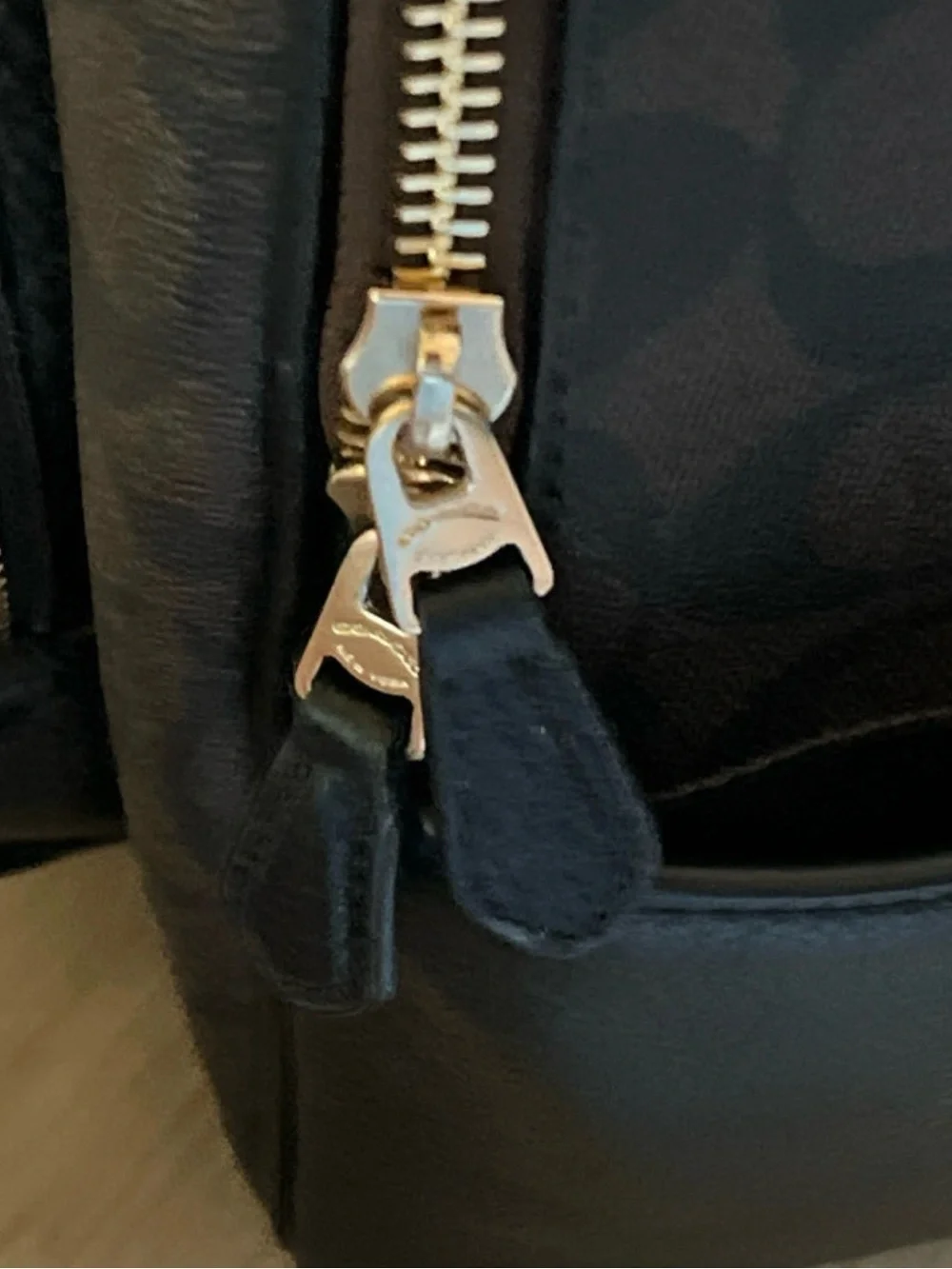 Coach compact pebbled