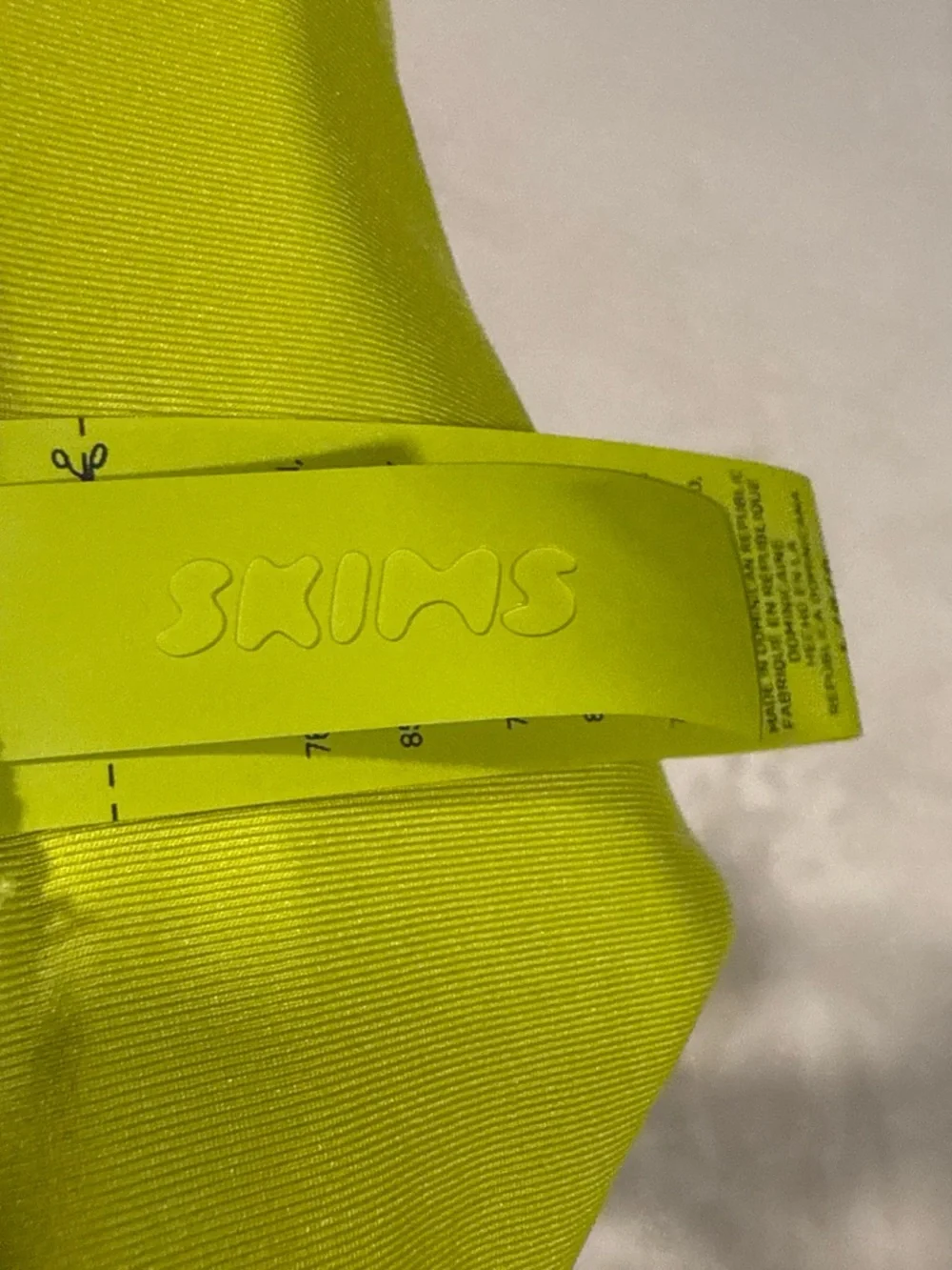 SKIMS tie side