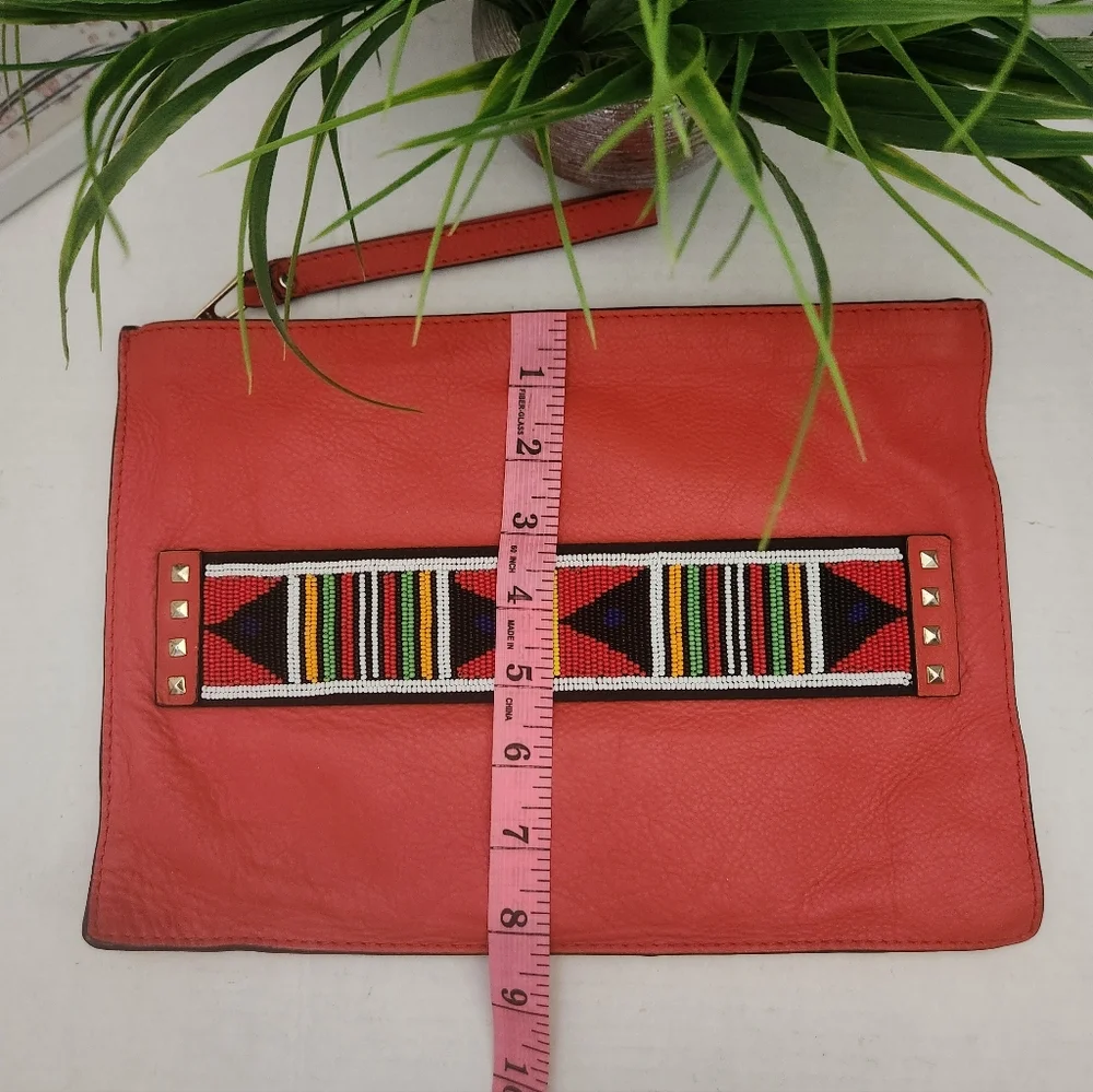 Coral Clutch with Tribal Accent