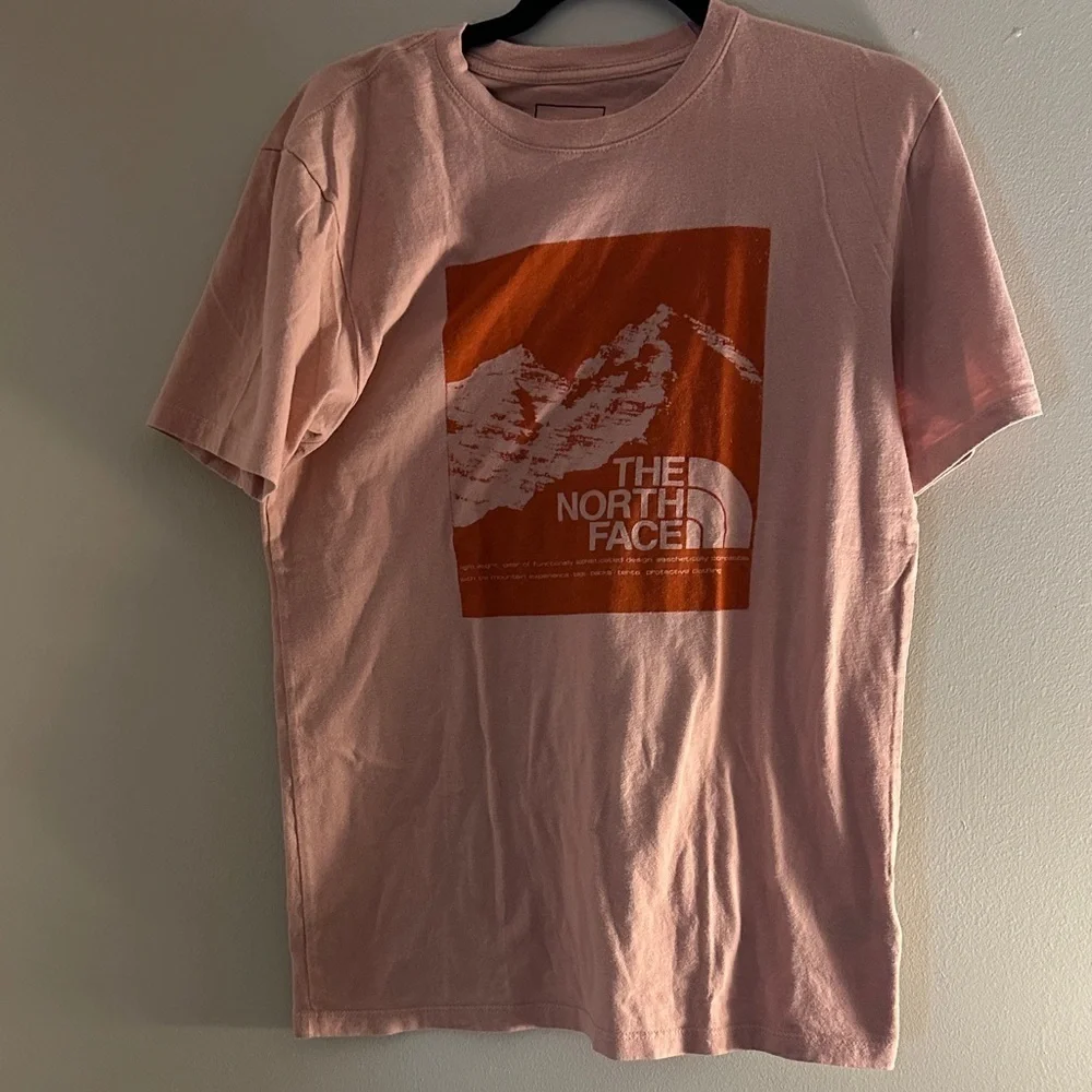 The North Face Men's Light Pink Tee with Orange Graphic