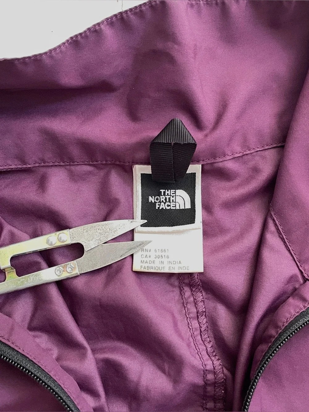 The North Face burgundy purple lightweight packable windbreaker jacket