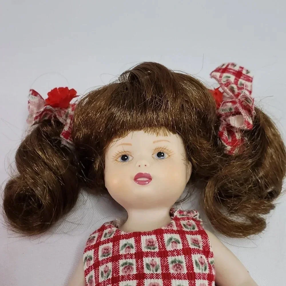 Vintage DELTON Porcelain Doll  Dressed In Red  7 Inch Tall Movable Arms & Legs