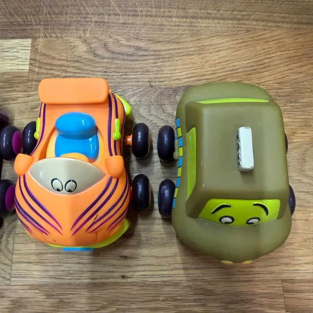 B. Toys Pull Back Trucks Taxi Cab Convertible Lot of 4 Flower Car Play Imaginati