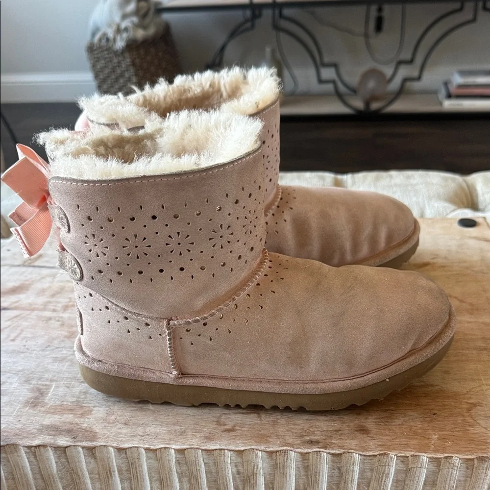 UGG women’s 6 Pink Suede Boots with Gold‎ Logo