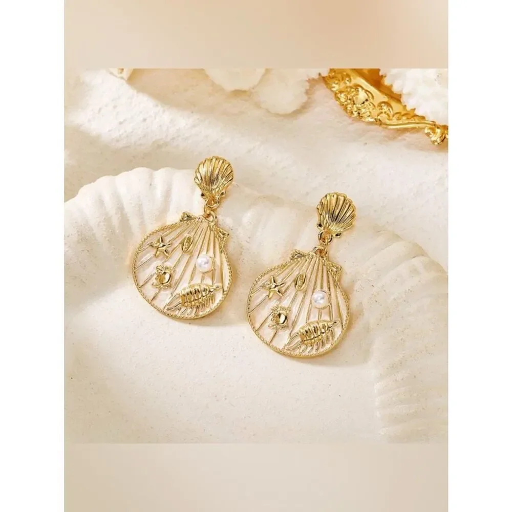 Anthropologie elegant gold