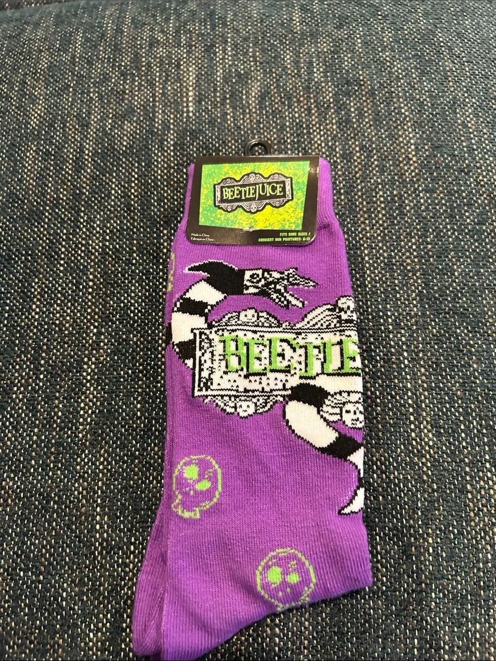 Beetlejuice Purple Graphic Crew Socks with Neon Green Accents