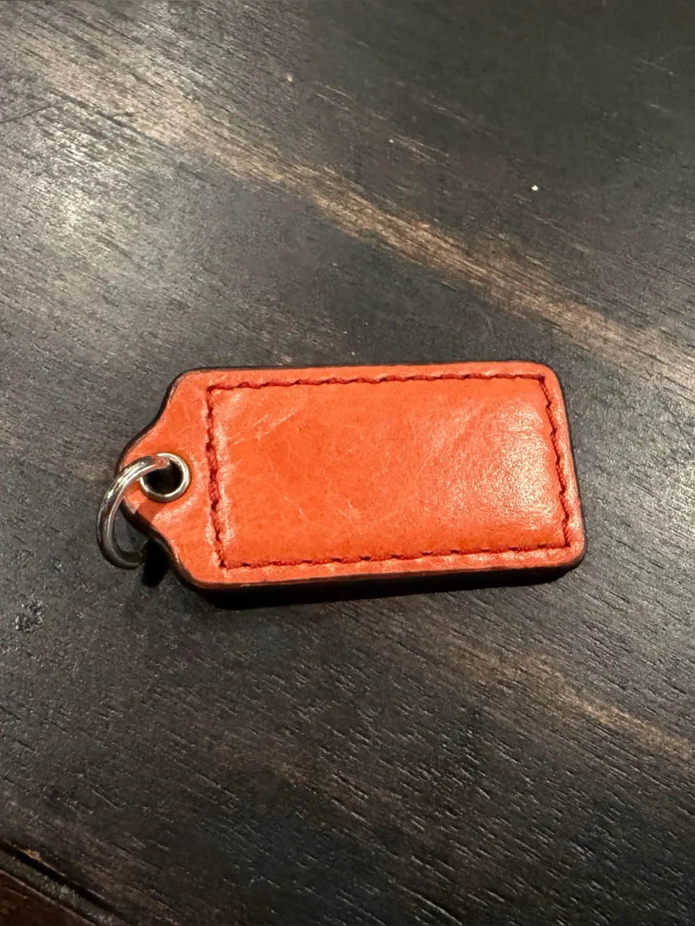 Coach orange hangtag