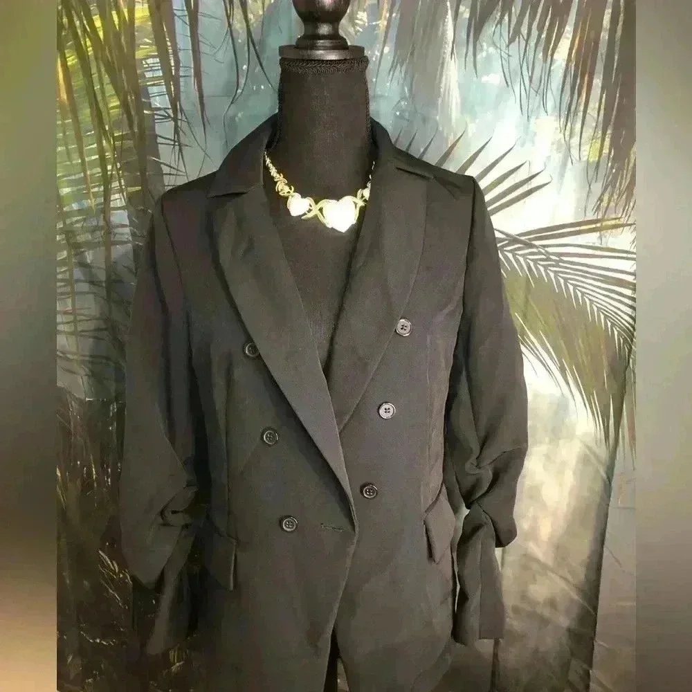 Women’s black blazer with rouched sleeves