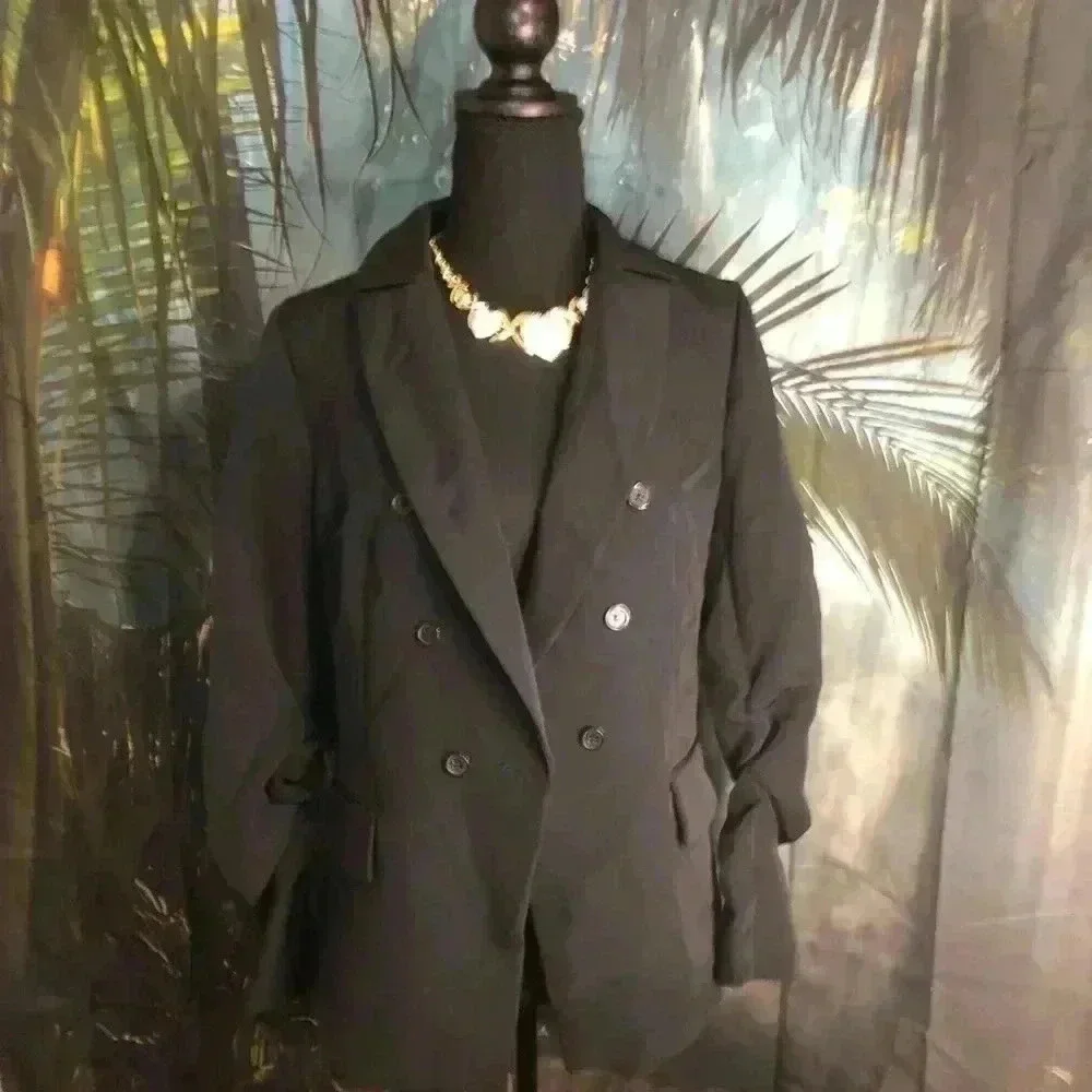 Women’s black blazer with rouched sleeves
