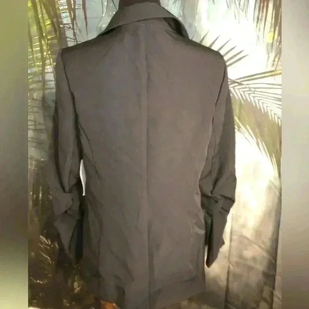 Women’s black blazer with rouched sleeves