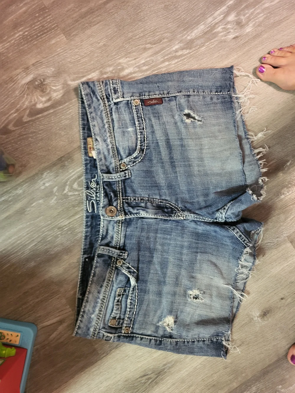 Silver Jeans Light Blue Distressed Denim Cutoff Shorts