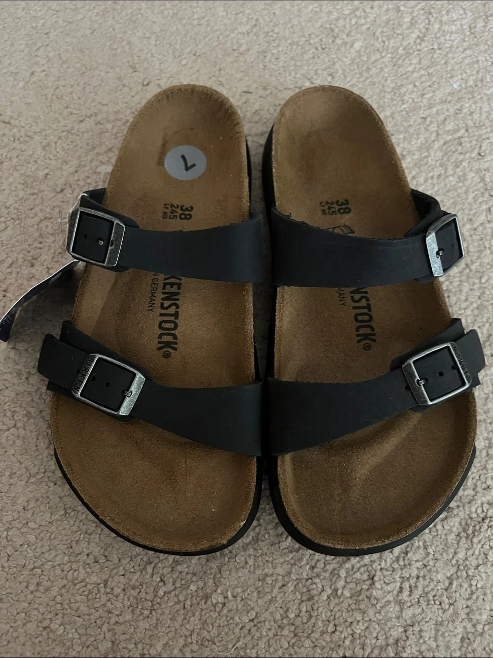 Birkenstock women’s black striped sandals