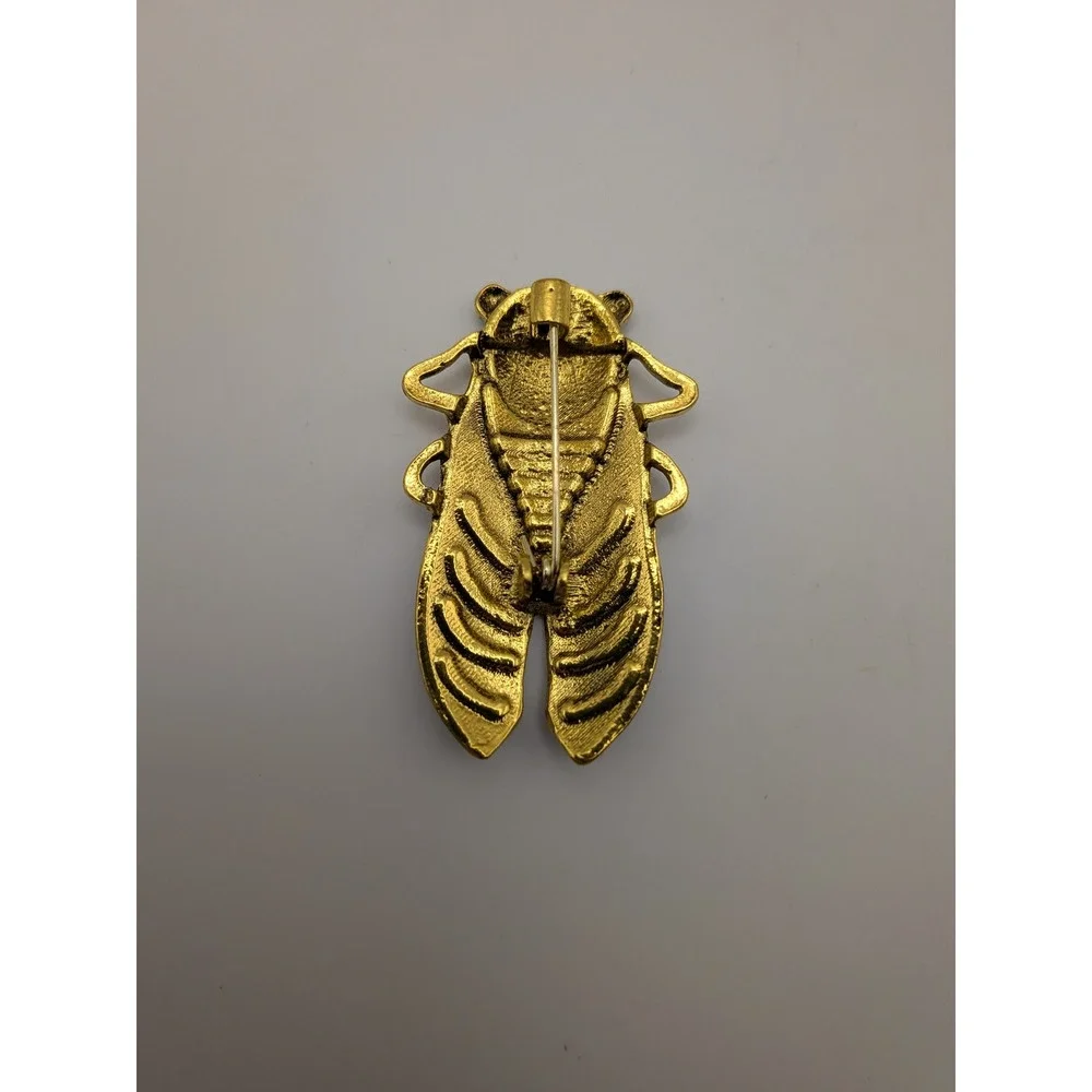 Unbranded enamel cicada