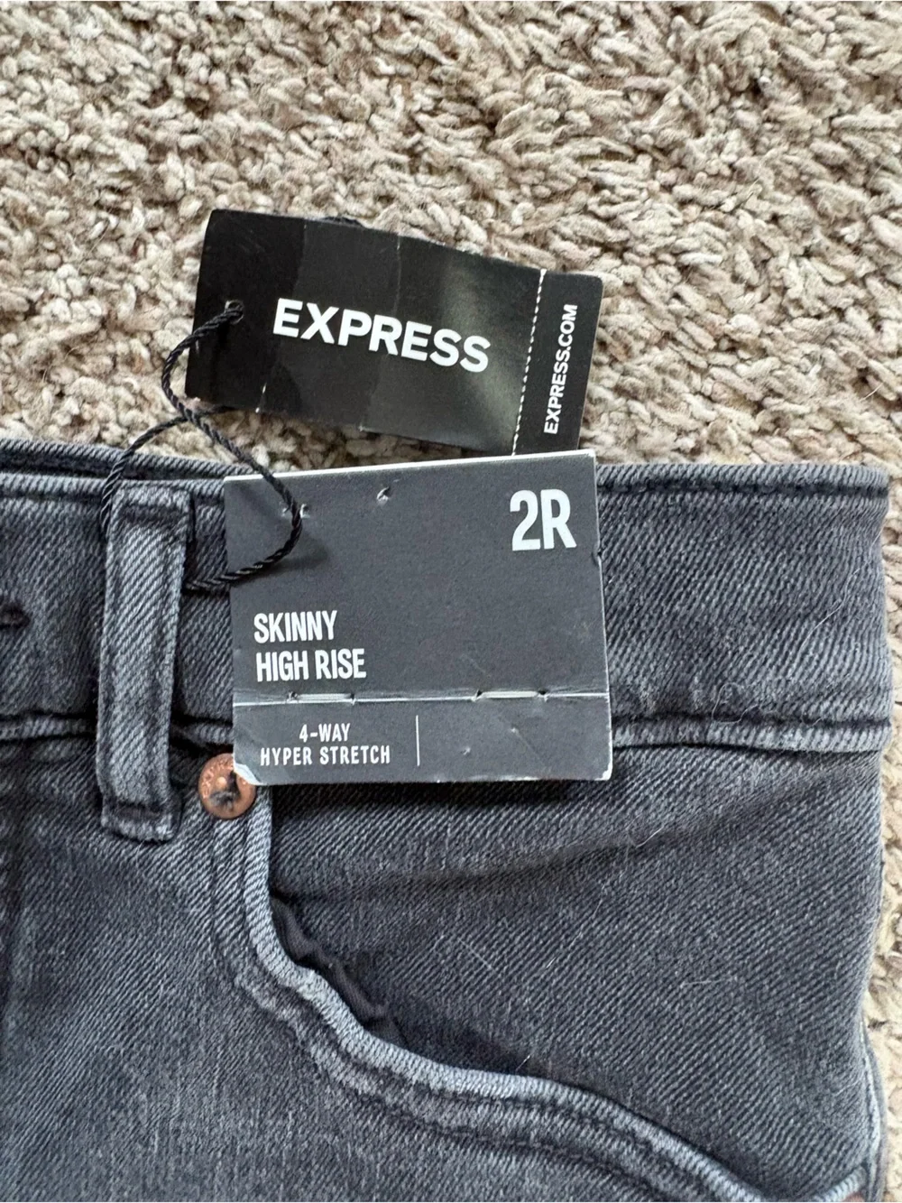 Express Women's Black Skinny Jeans with Knee Rips