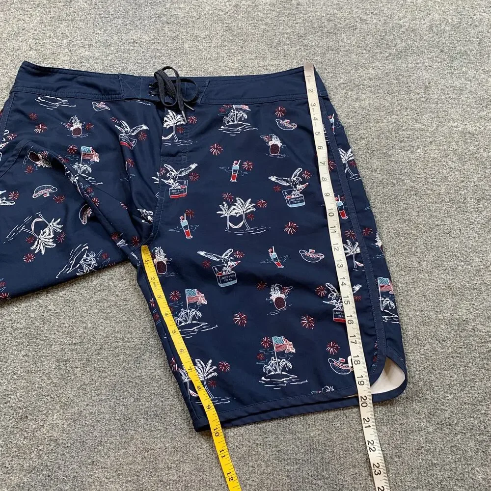 Travis Mathew Board Shorts Mens 36 Blue Sweet Land Of Beer Beach Swim Surf