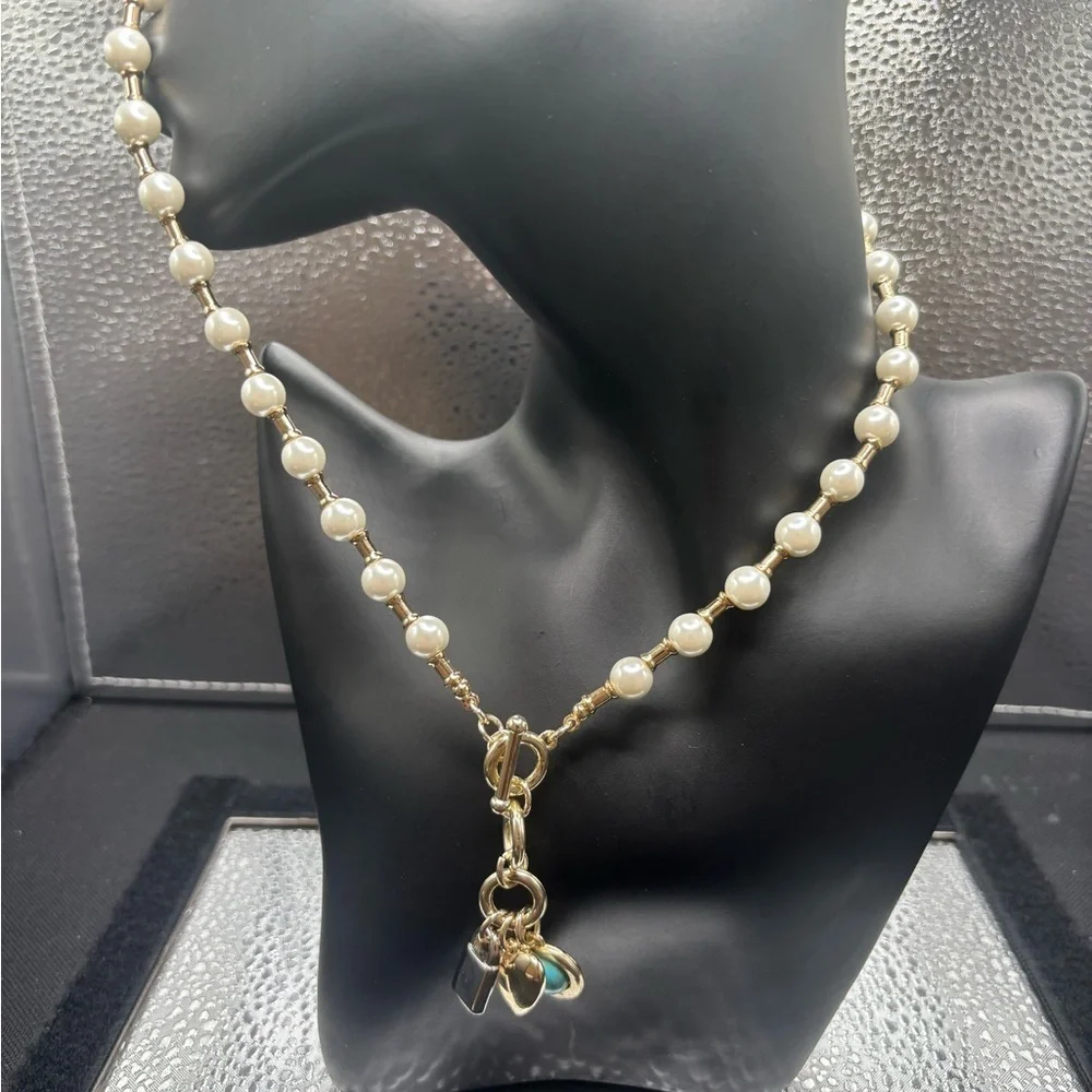 Elegant Pearl and Gold Necklace with Turquoise charm, a heart and a lock.