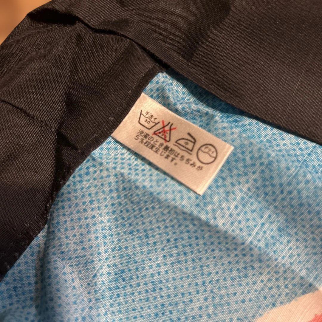 Blue Happi Coat with Wave Pattern and Red Text