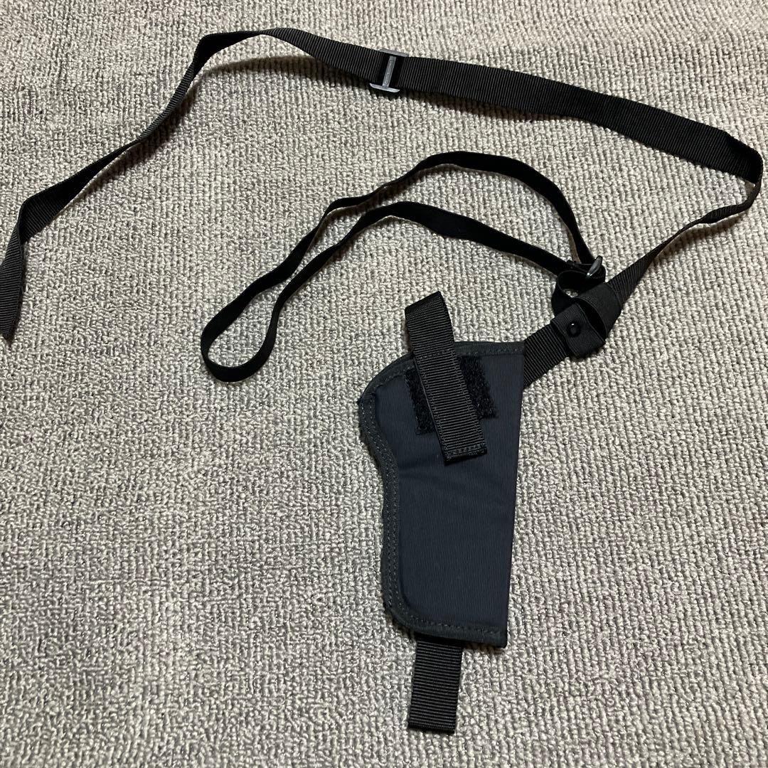 Black holster with adjustable strap