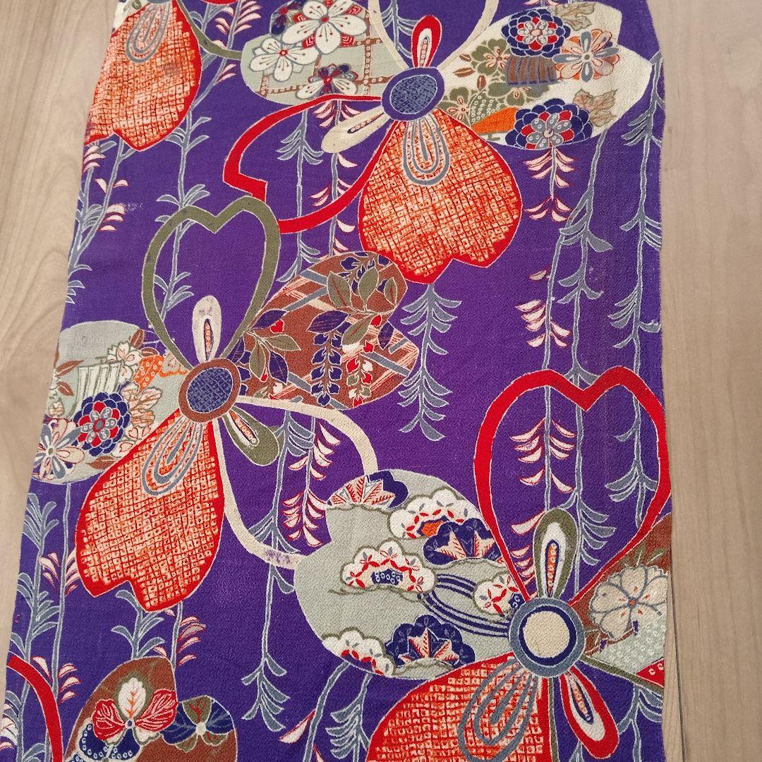 Pure silk chirimen (crepe fabric) with a purple background and cherry blossom pattern