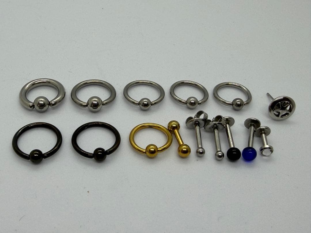 14 Body Piercings + 1 Earring, 18-12G Star Body Piercing Earrings