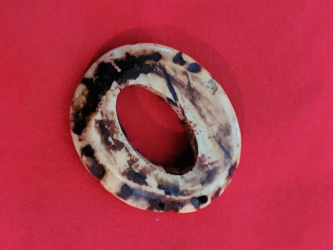 Netsuke? Tsuba?