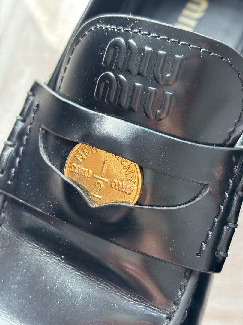 Almost new Miu Miu black leather loafers, size 23.5cm