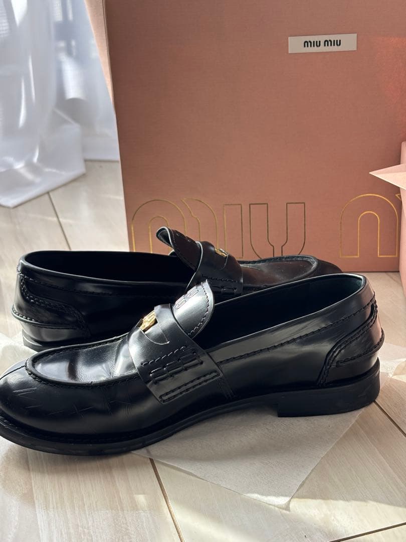 Almost new Miu Miu black leather loafers, size 23.5cm