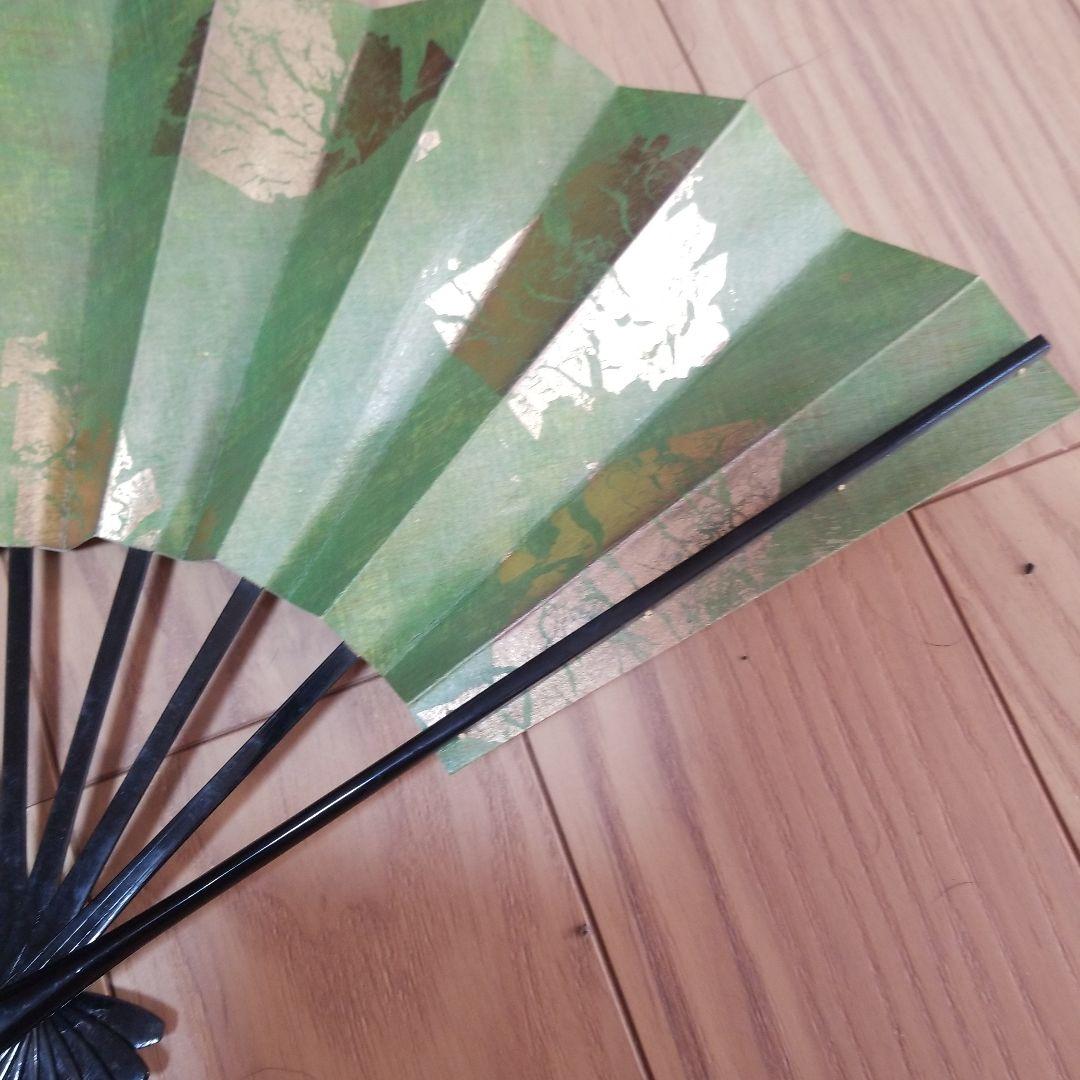 Beautiful green folding fan with gold leaf mountain pattern