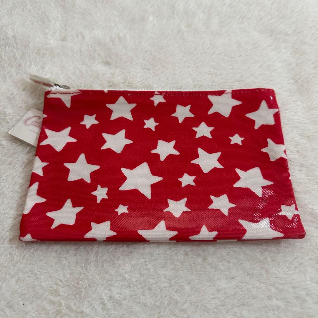 New, unused, with tags attached. Cath Kidston Shooting Star Zip Pass Case, Red.