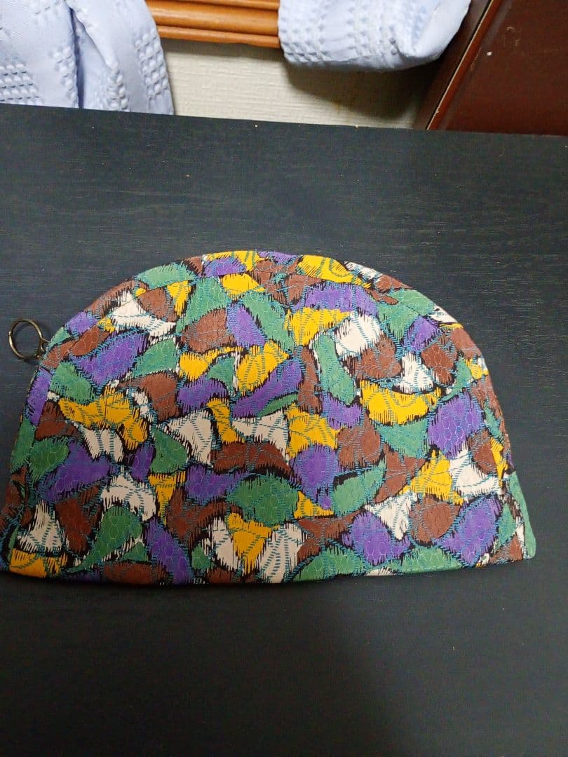 Half-moon pouch