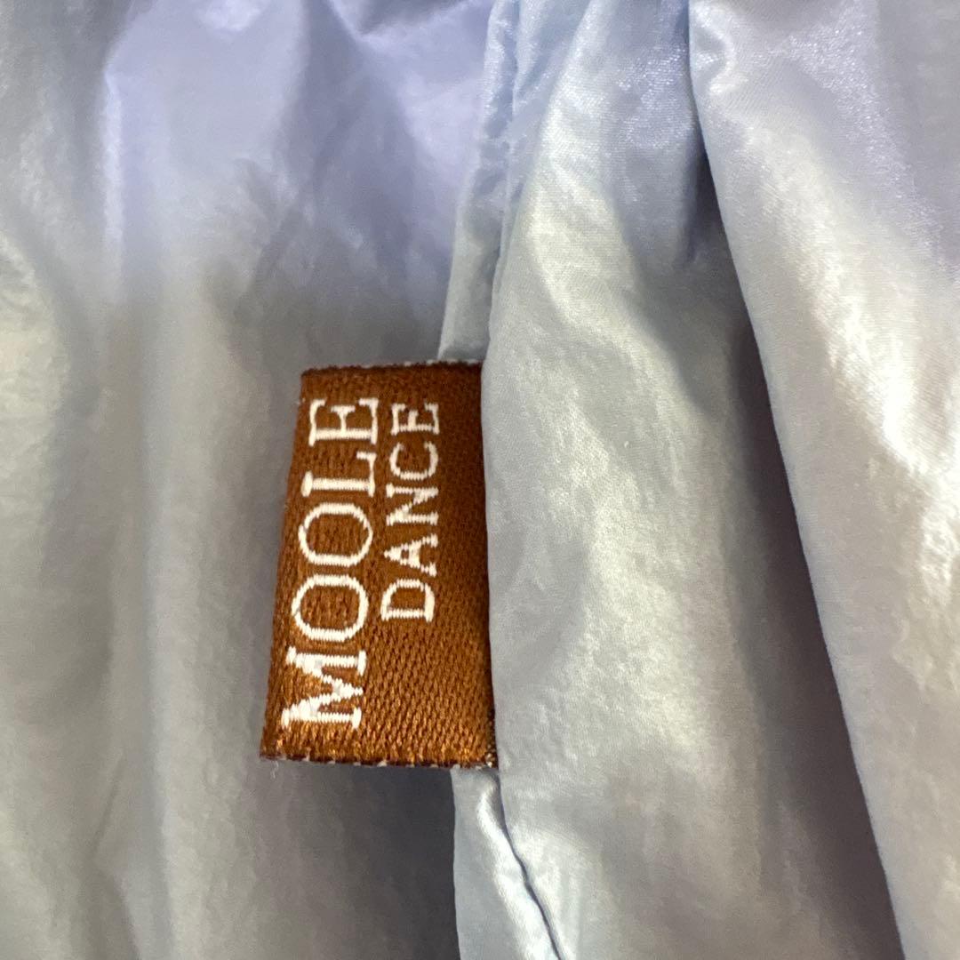 Nylon warm-up shorts, size M, reversible in light blue and beige.